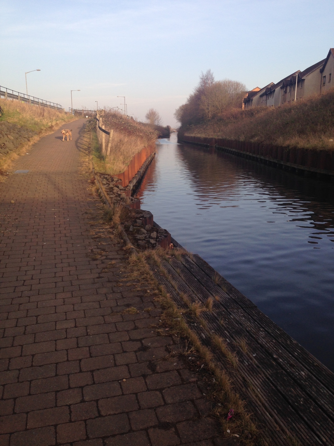 Towpath sloping up to road